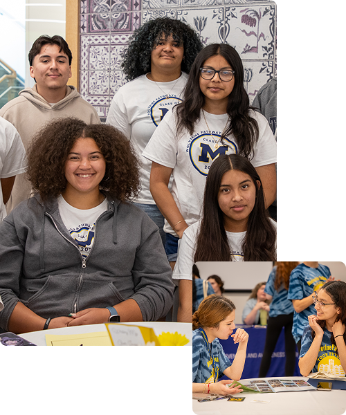 Students collaborating while wearing U-M shirts.